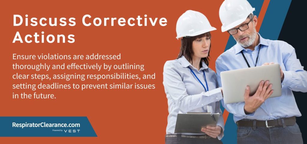 An image showing two people discussing OSHA corrective actions